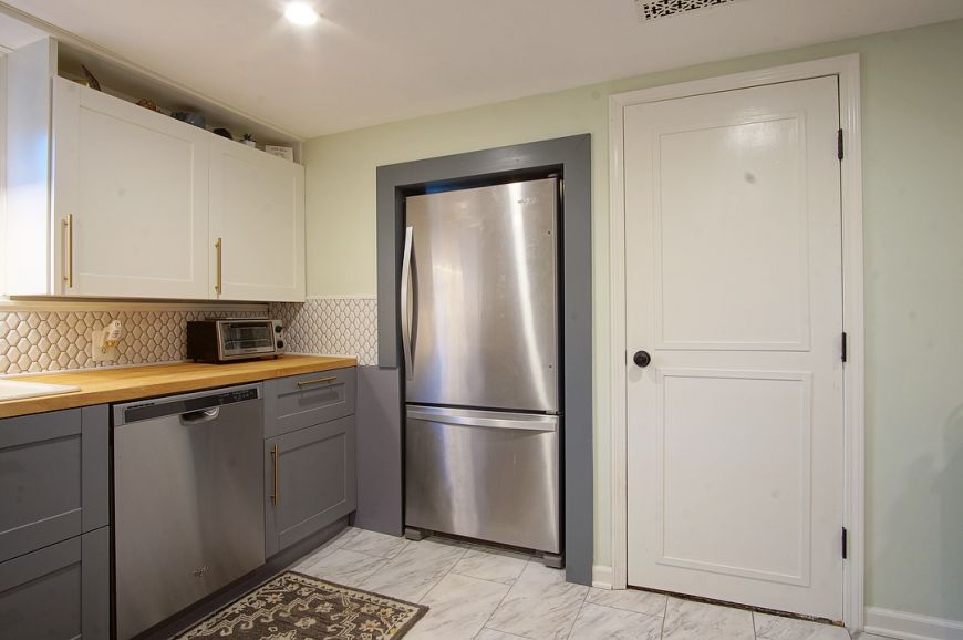 custom fridge cubby hole in wall kitchen