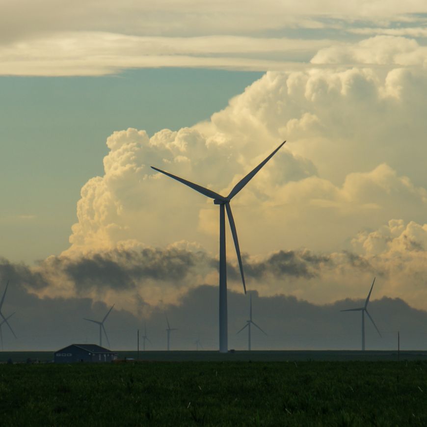 Wind turbine with backdrop of dramatic storm clouds