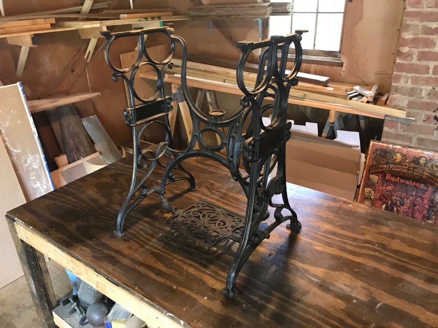 cast iron legs from a sewing machine