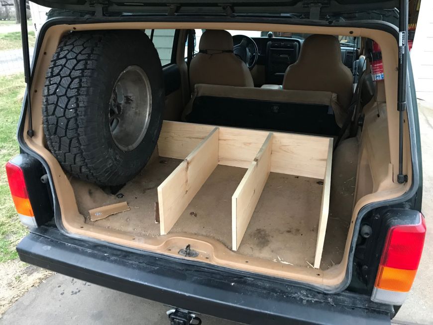 jeep xj cherokee cargo storage sleeping platform folding rear seat