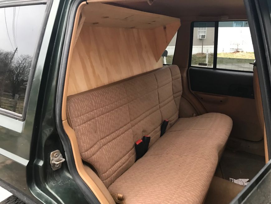 storage seat rear jeep cherokee cargo platform xj stow system overland build sleeping truck way fold folds down folding rig